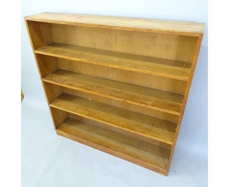 A 1920s light oak 4-tier open bookcase, 120cm x 120cm x 24cm 
