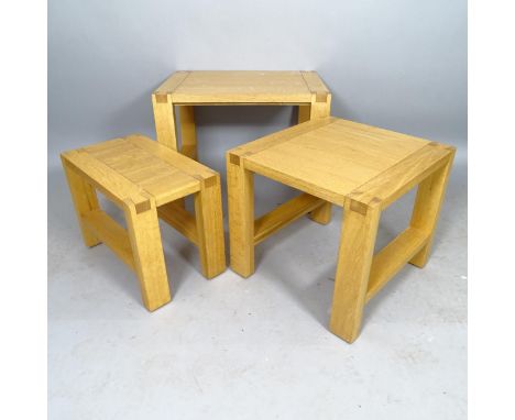 A John Lewis contemporary nest of 3 light oak occasional tables, largest 64cm x 49cm x 48cm 