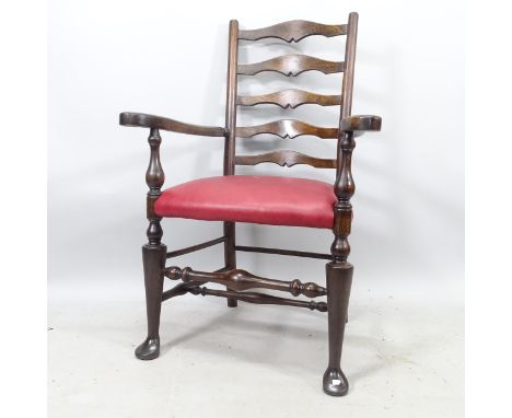 An Antique style ladder-back armchair, with red leather seat 