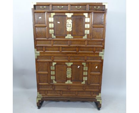 A Chinese elm 2-section cabinet, with 4 short frieze drawers, panelled cupboards and brass mounts, 86cm x 138cm x 37cm 