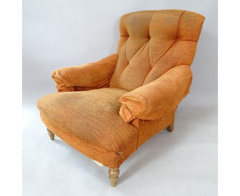 A Howard style button-back upholstered armchair 