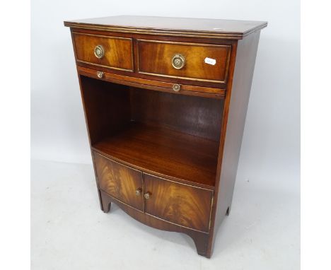 A mahogany bow-front side/bedside cabinet, with drawers, brushing slide and cupboards under, 53cm x 77cm x 33cm 