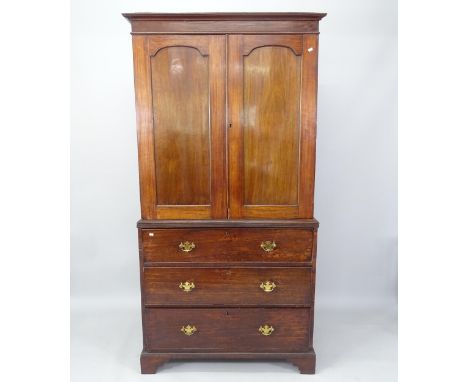 An Antique mahogany 2-section linen press, the top section having a hanging rail and bottom with 3 long drawers, 101cm x 200c