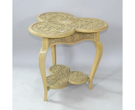 A modern light oak 2-tier clover design occasional table, with chip carved decoration, 60cm x 60cm 