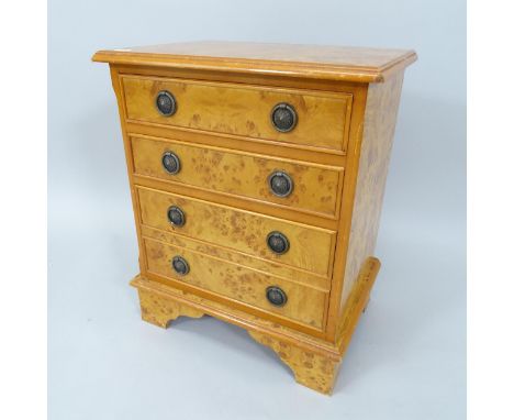 A small burr-walnut veneered chest of 4 drawers, on bracket feet, 42cm x 52cm x 30cm 
