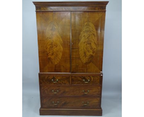 A Georgian mahogany 2-section linen press, with top section fitted with 4 slides, and lower section with 2 short and 2 long d
