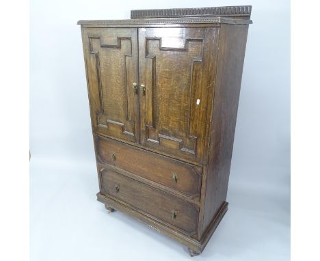 A 1930s oak compactum with slide fitted top and 2 drawers under, 89cm x 150cm x 49cm 