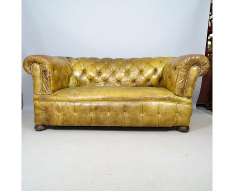 A Victorian button-back leather upholstered Chesterfield horsehair 2-seater sofa, with single-drop end, L178cm 