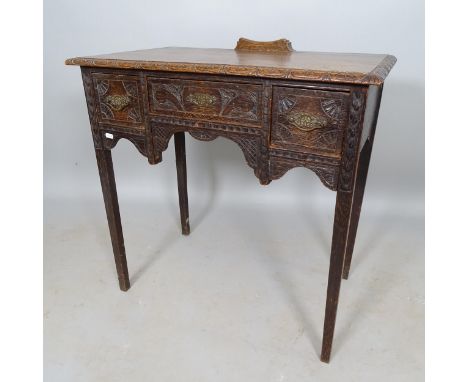An Antique carved oak hall/side table, with 3 fitted drawers, 76cm x 75cm x 45cm 