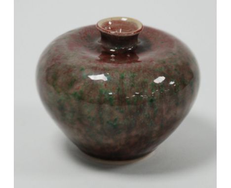 CHINESE FLAMBE GLAZED PORCELAIN VASE, of squat form with waisted neck, glazed in mottled tones of red, grey and green, 3 1/2"