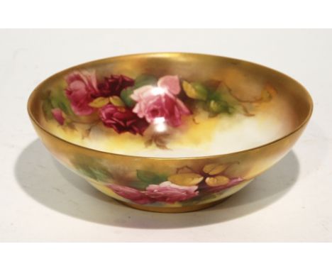 EARLY 20th CENTURY ROYAL WORCESTER PORCELAIN SHALLOW BOWL OF CYMA OUTLINE, painted with rose sprays, with shaded gilt edged b