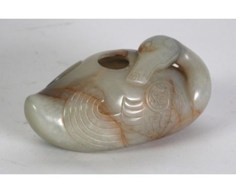 A GOOD CHINESE QING DYNASTY PALE CELADON JADE CARVING with russet inclusions, in the form of an  archaistic duck, shallowly c
