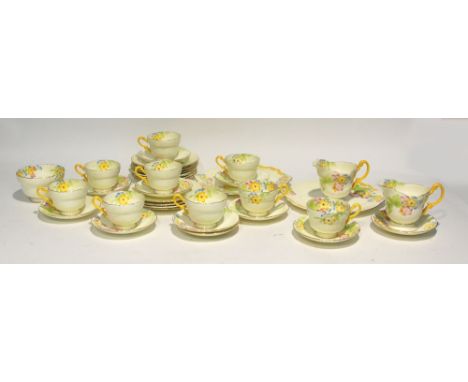 THIRTY SEVEN PIECE ROYAL PARAGON CHINA PART TEA SERVICE, now suitable for nine persons, printed and washed with colour flower