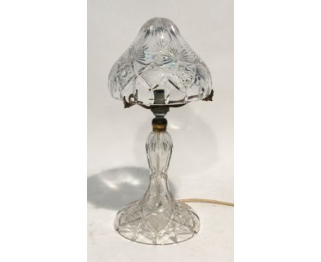 MID TWENTIETH CENTURY CUT GLASS TABLE LAMP, with domed shade, slender baluster column with spreading foot and electroplated m