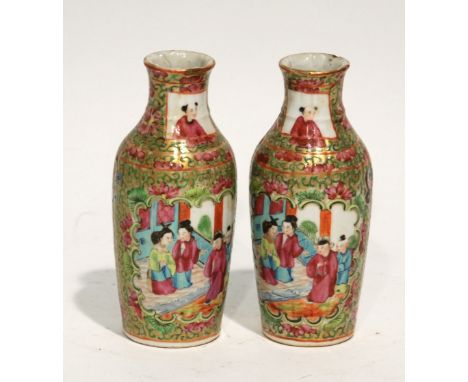 PAIR OF CHINESE FAMILLE ROSE PORCELAIN SMALL VASES, of tapering form with waisted necks, each painted with panels depicting f