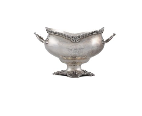 A GEORGE III SILVER SAUCE TUREENLondon 1765, mark of Daniel Smith & Robert Sharp, of oval baluster form with twin handles, ga