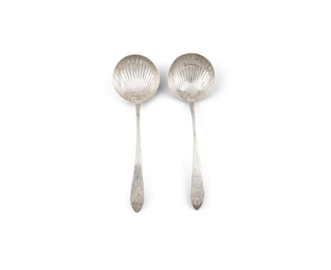 A PAIR OF IRISH GEORGE II SILVER SAUCE LADLES,Dublin c.1789, mark of John Shields, with brightcut decoration and scallop shel