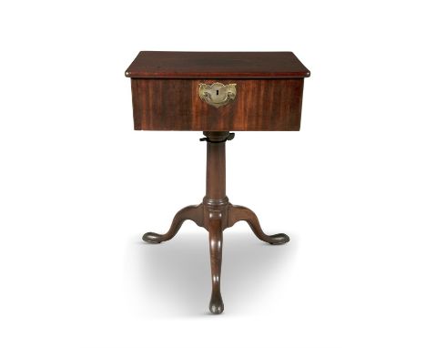 A GEORGE III MAHOGANY RECTANGULAR TRAVELLING DESKThe lift top opening to reveal a baize lined interior, fitted hinged side pa