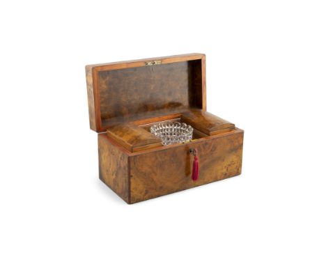 A 19TH CENTURY WALNUT TEA CADDY, of flat rectangular shape, enclosing a divided interior, with cut glass container inside, 30