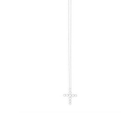 A DIAMOND PENDANT ON CHAIN, the Latin cross set with brilliant-cut diamonds, suspending from a fine trace-link chain, pendant