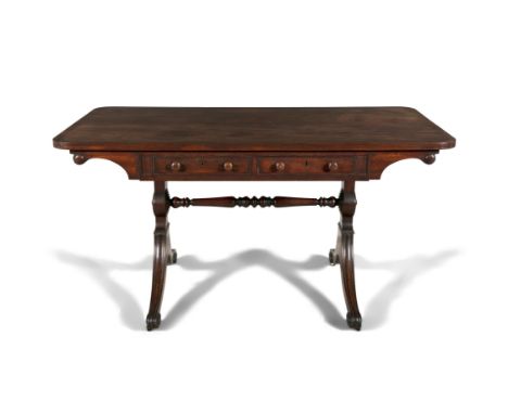 A VICTORIAN MAHOGANY SOFA TABLEFitted with twin frieze drawers and opposing false drawer fascia, on splayed legs adjoined by 