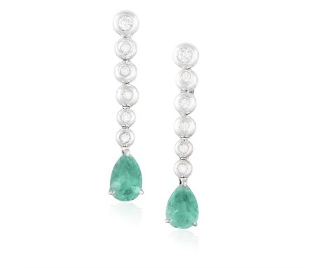 A PAIR OF EMERALD AND DIAMOND PENDENT EARCLIPS, each composed of a graduated line of brilliant-cut diamonds within collet-set