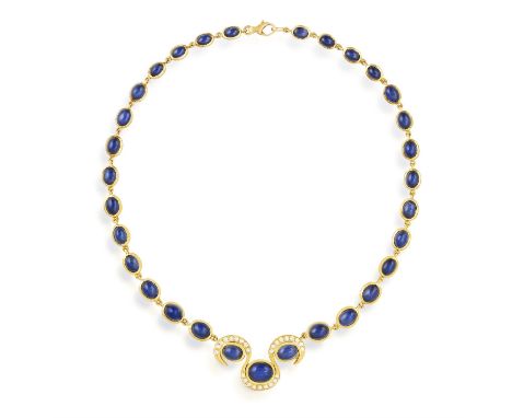 A SAPPHIRE AND DIAMOND PENDANT NECKLACE, composed of a row of graduated oval-shaped sapphire cabochons, suspending three larg