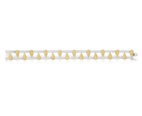 A DIAMOND BRACELET, of openwork design pave-set throughout with brilliant-cut diamonds with pear connectors pavé-set with sim