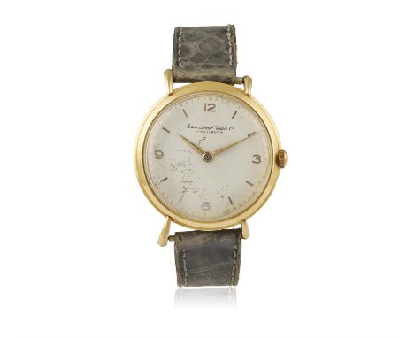 AN 18K GOLD MANUAL WIND WRISTWATCH, BY IWC, CIRCA 1960, of manual wind movement Cal-C89, the silvered circular dial with Arab