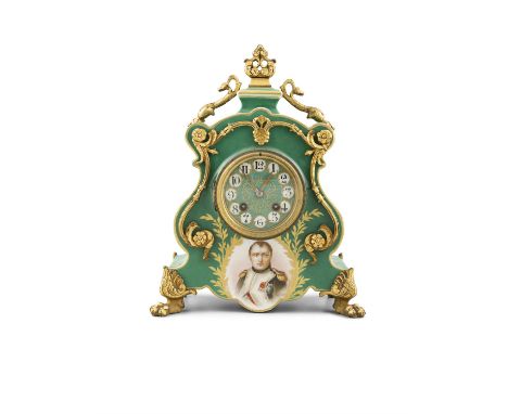 A FRENCH PORCELAIN AND GILT METAL MOUNTED MANTLE CLOCKThe arched top surmounted by gilt metal final, above a dial painted wit