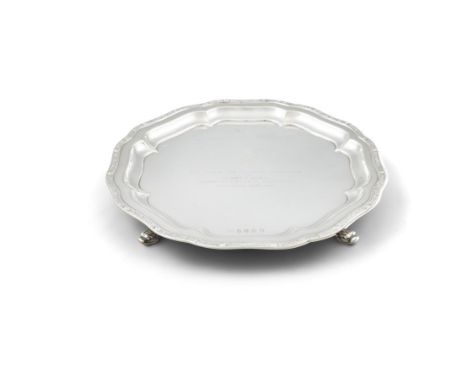 A MODERN IRISH SILVER PRESENTATION SALVERDublin 2000, mark of J.M. of shaped circular form, with Celtic pattern border, the r
