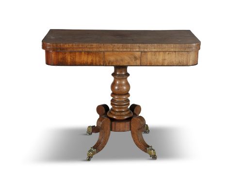 A GEORGE IV MAHOGANY RECTANGULAR FOLDING TOP CARD TABLE,above a plain frieze and raised on baluster turned centre pillar and 