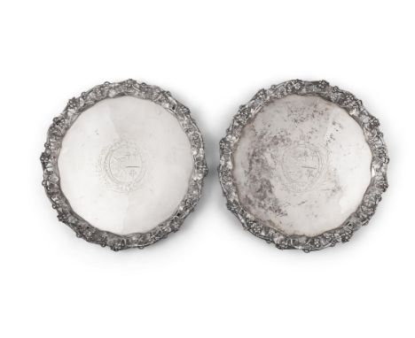 A PAIR OF GEORGE II SILVER SALVERSLondon 1758, mark of Edward Wakelin, of shaped circular form with raised, cast and pierced 