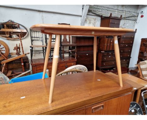 A 1960s Ercol light elm coffee table, model 213, height 45cm, width 72.5cm and depth 44.5cm.Condition- generally good, there 