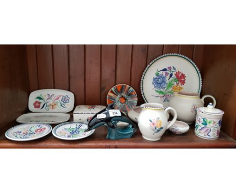 14 Poole pottery items including jugs, lidded box etc. 