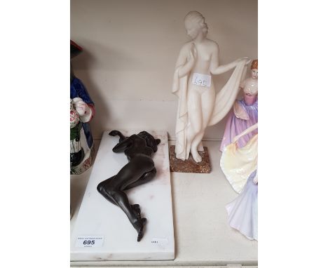 Marble figure of a girl and a bronze on marble reclining nude 