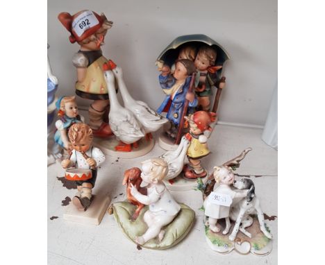 Seven Hummel figures and two Naples figures 