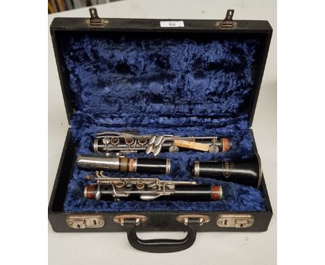 A Corton clarinet with case. 