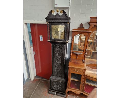 A Georgian carved oak 8 day longcase clock with brass dial, by John Farley, Fecit, complete with weights and pendulum. 