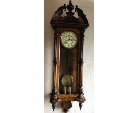 A double weight walnut Vienna wall clock. Condition- case appears to be in good condition with no sign of woodworm, the numbe