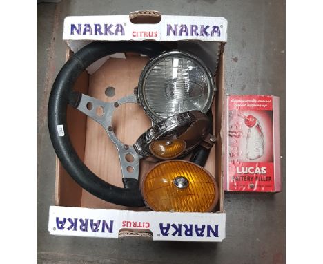 Classic car parts comprising a pair of Lucas Ranger lamps, a Miller foglamp, an Astrali 13" steering wheel and a Lucas batter
