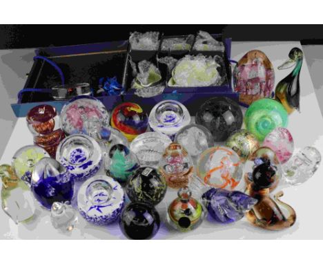 A collection of over thirty glass paperweights to include Caithness examples. 