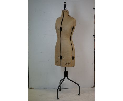 A c.1945 Chil-Daw Pioneer dressmakers mannequin No.344739, British made 32-39, six adjustable wheels and 5ft in height. 