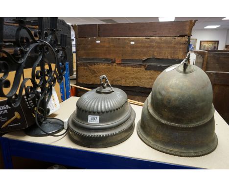 Three antique silver plated Cloche's together with a wrought iron table lamp. 