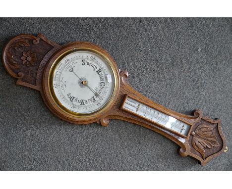 An oak cased barometer, 20th century. 