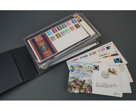 A collection of British first day covers contained within an album together with some loose examples. 