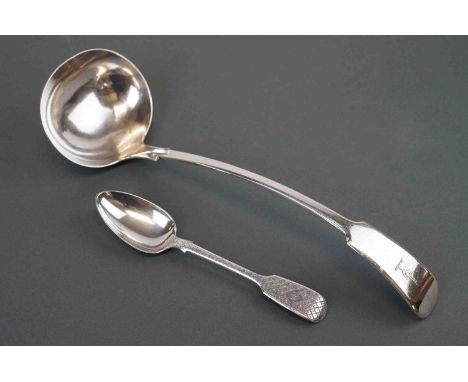 A fully hallmarked sterling silver Victorian table spoon with bright cut decoration, assay marked for London and dated for 18