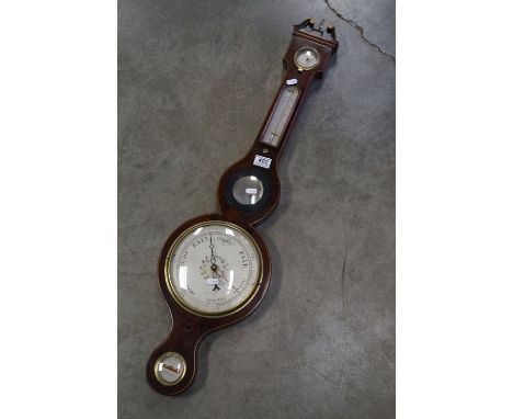 An antique Kidby Weeley mahogany cased banjo barometer. 