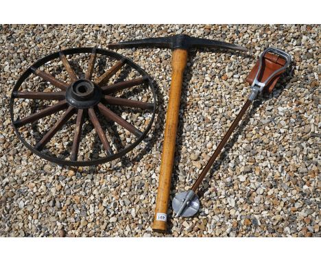 A group of mixed collectables to include a hunting stick, a Morpic pick axe and a twelve spoke artillery wheel. 