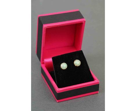 Pair of yellow gold opal stud earrings 